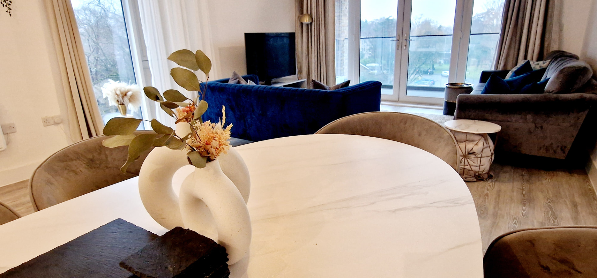 Luxury London apartment interior with floor-to-ceiling windows